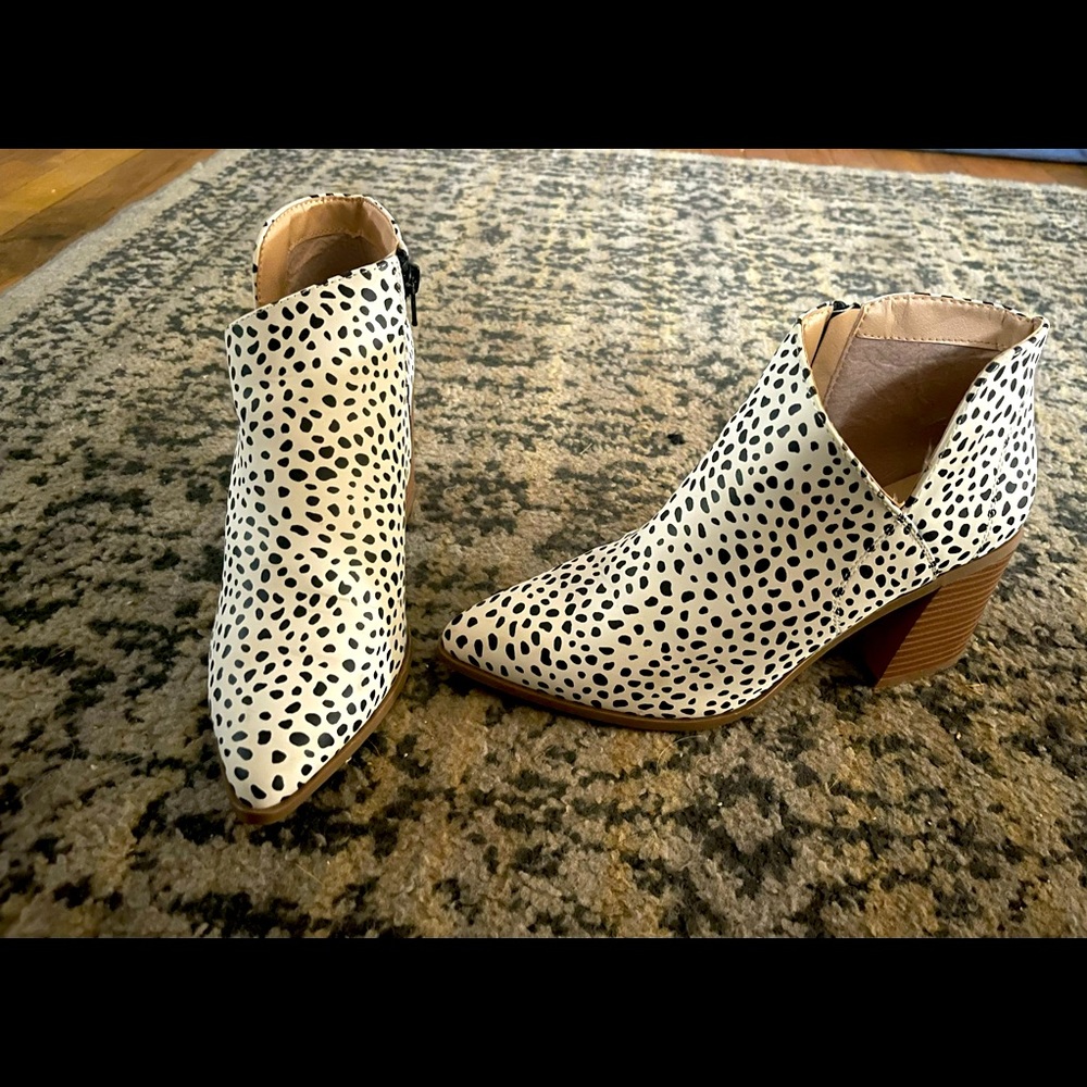 Black and white ankle high booties